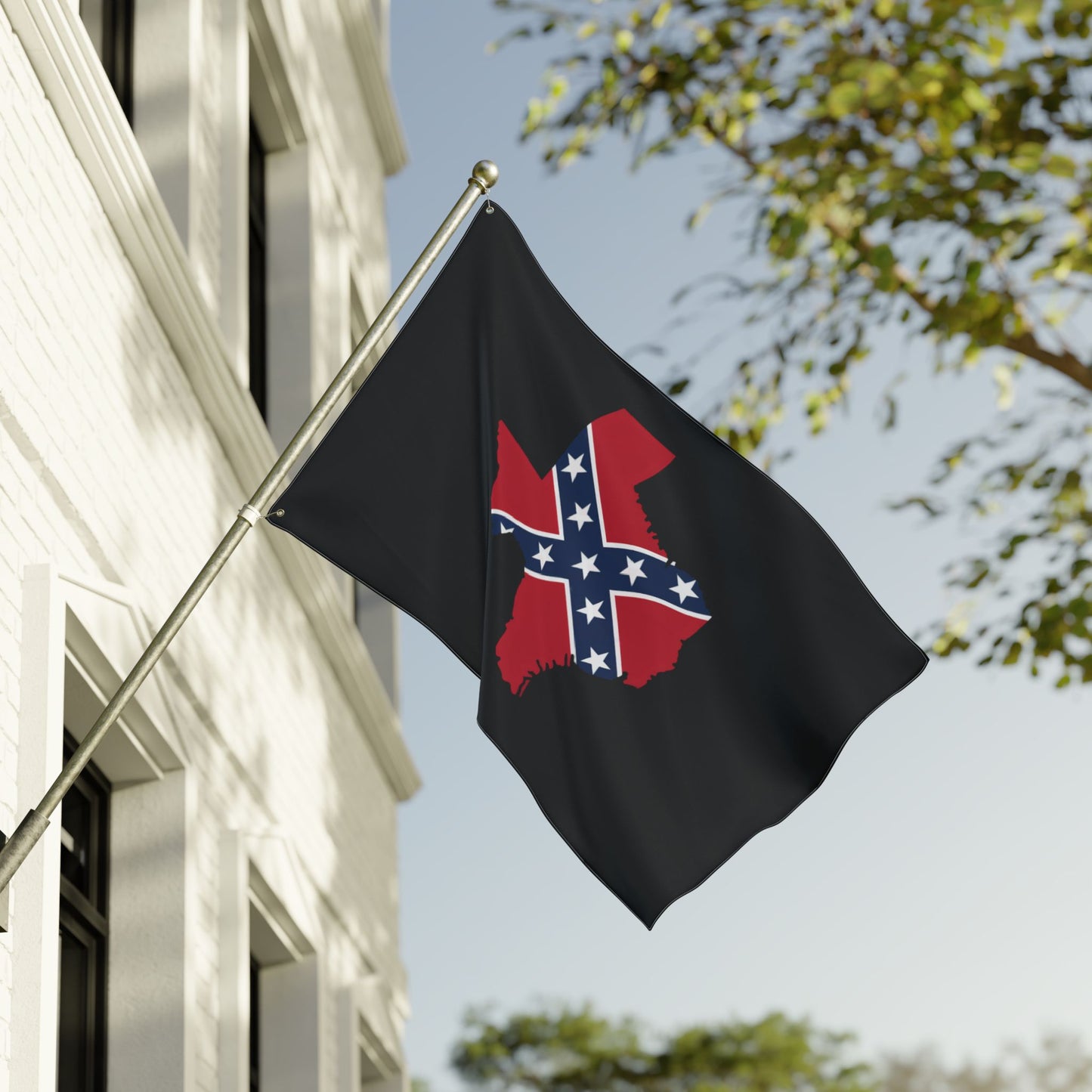 Confederate Texas outdoor flag with black background flying on a pole attached to white house exterior