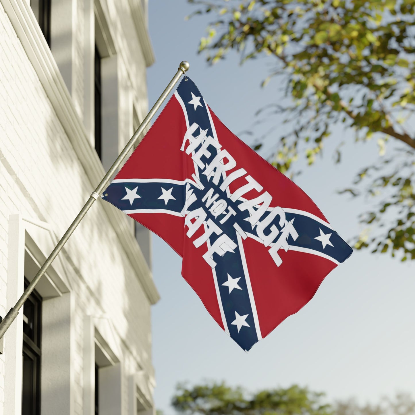 Heritage not hate flag with Confederate design hanging on a residential home exterior