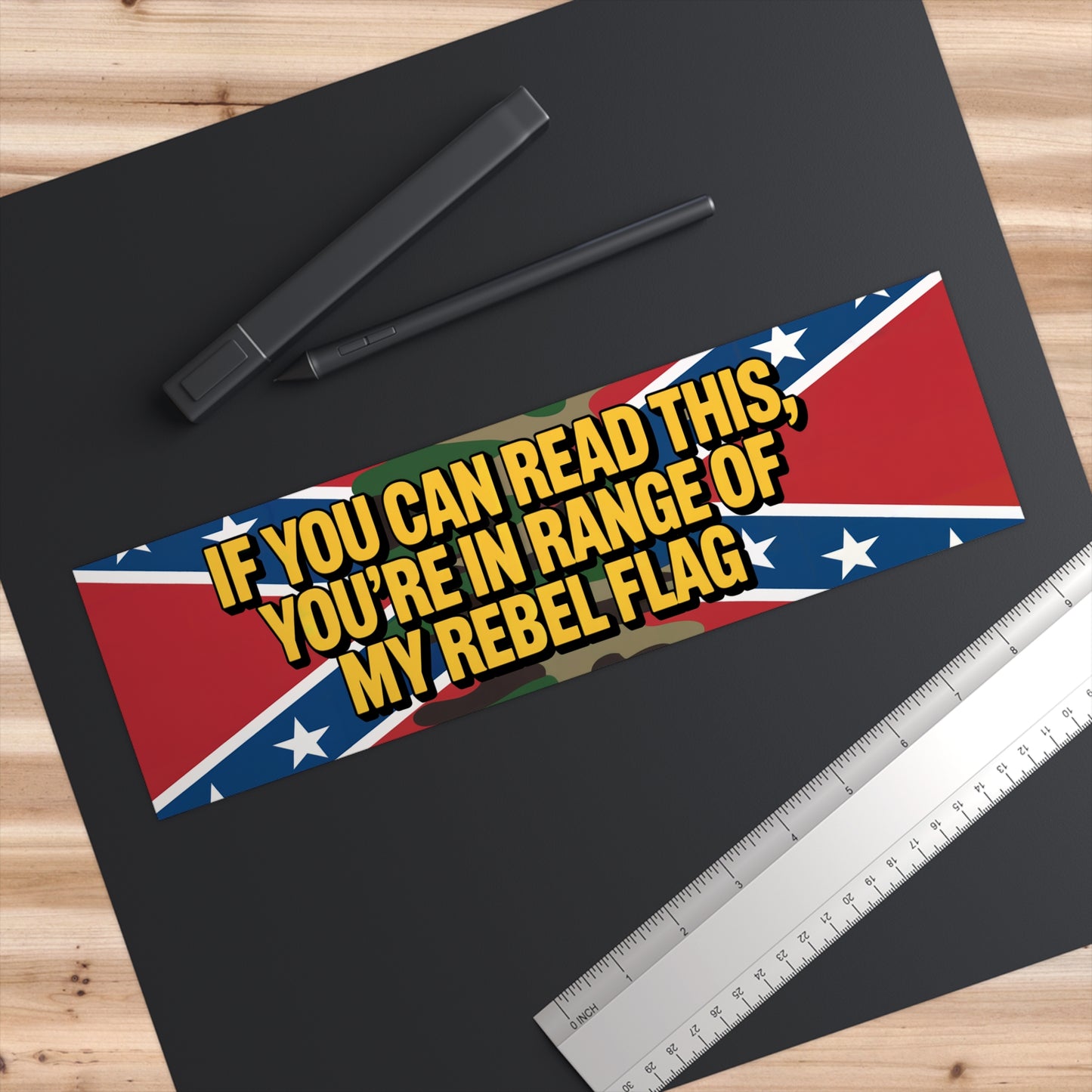 rebel flag bumper sticker with camouflage background and yellow text on Confederate flag design